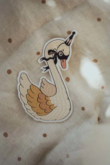 Mrs Mighetto Silitysmerkki, Dear Swan